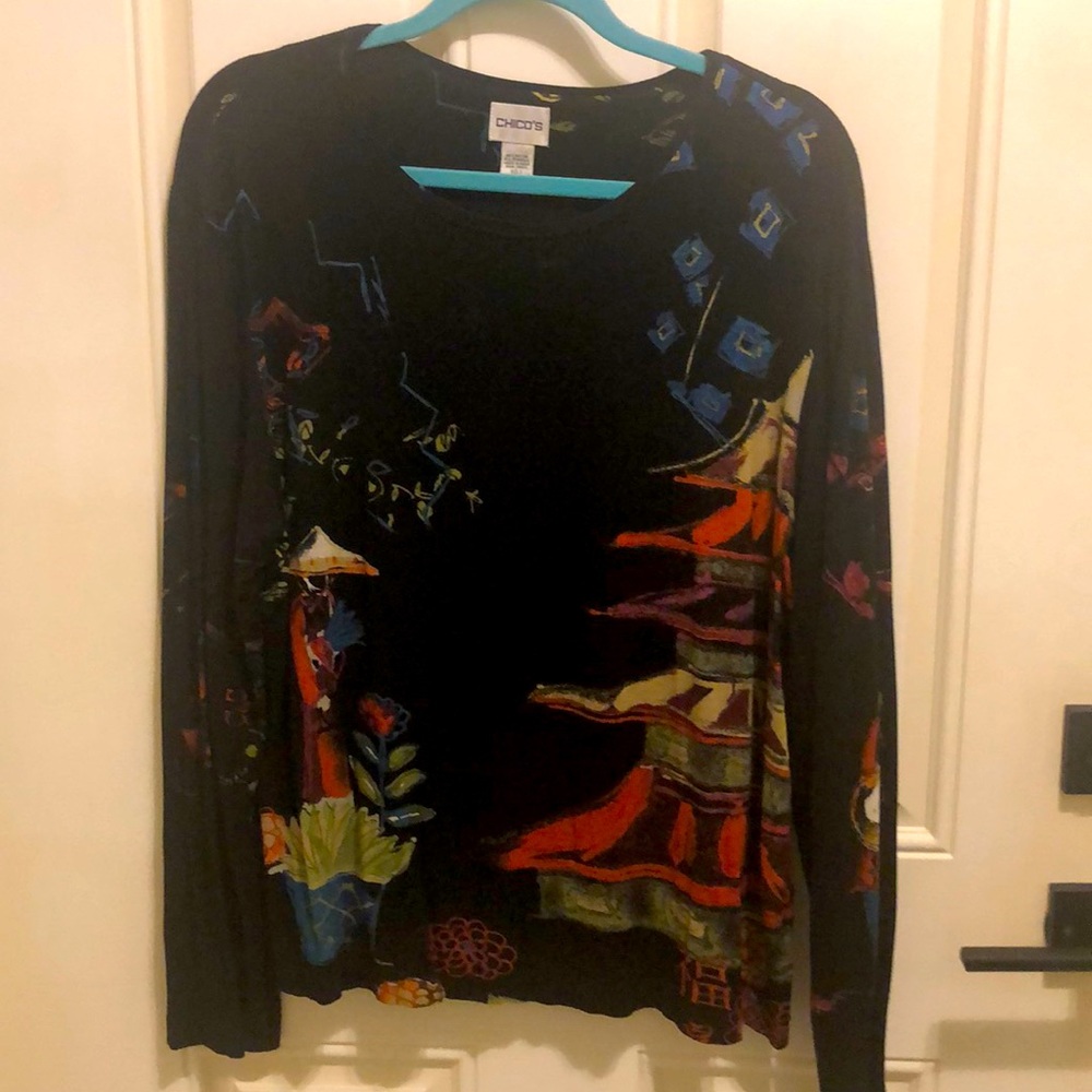 Chicos size 3, medium white scoop, neck, long sleeve black top with print